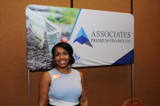 Felicia Taylor, Director of APFCO, at the tradeshow booth