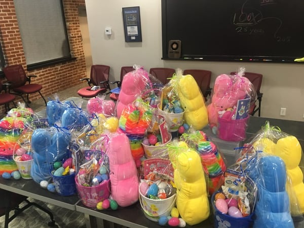 table full of easter buckets and toys