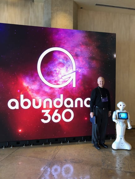 tony caldwell in front of an abundance 360 backdrop