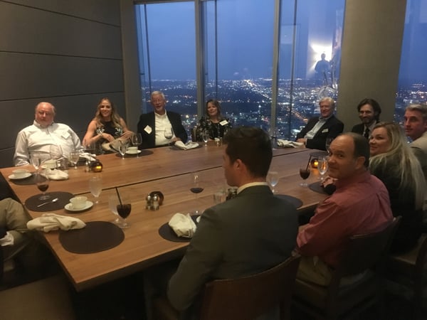 team sitting around a table 