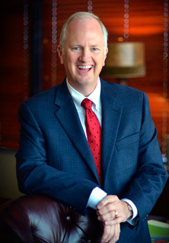 closeup of a man in a suit and tie