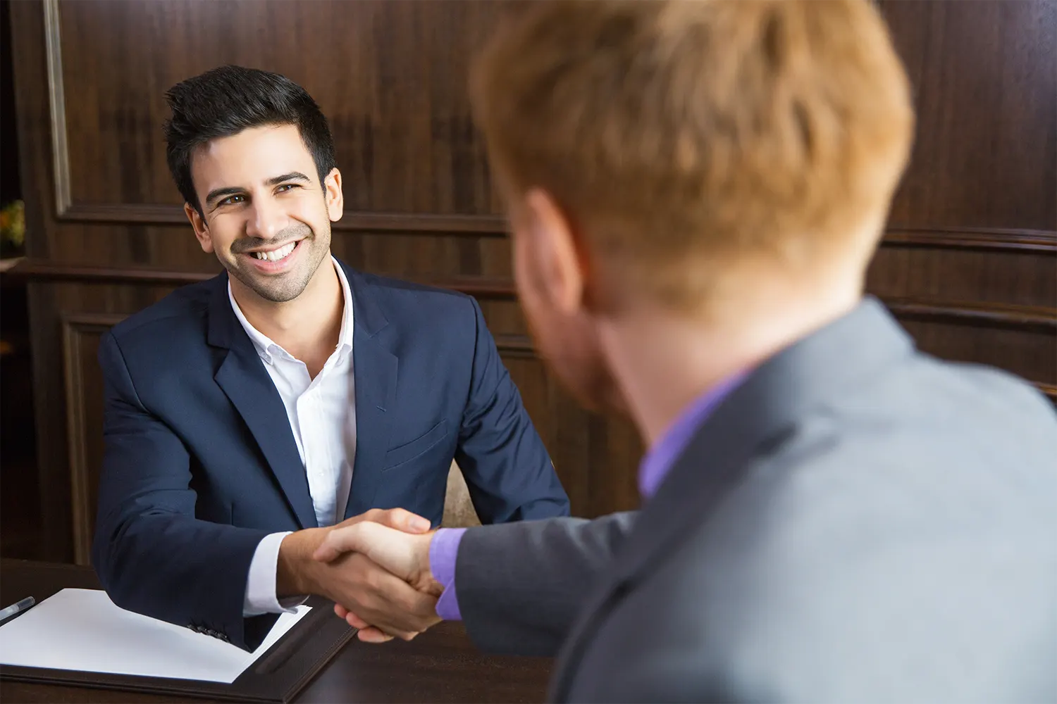 two businessmen shaking hands